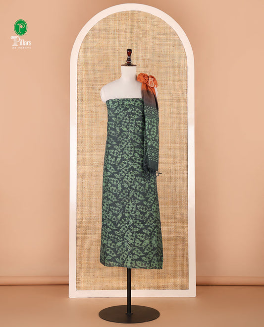 Leaf green chudidhar material, leaf batik-print bhagalpuri cotton top,contrast batik-print bottom & dual-color printed mul-mul dupatta
