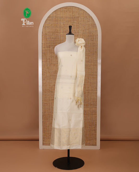 Kerala cream chudidar material, zari buttas & rose-like flowers woven taffeta silk top, plain santoon bottom & zari designs dupatta