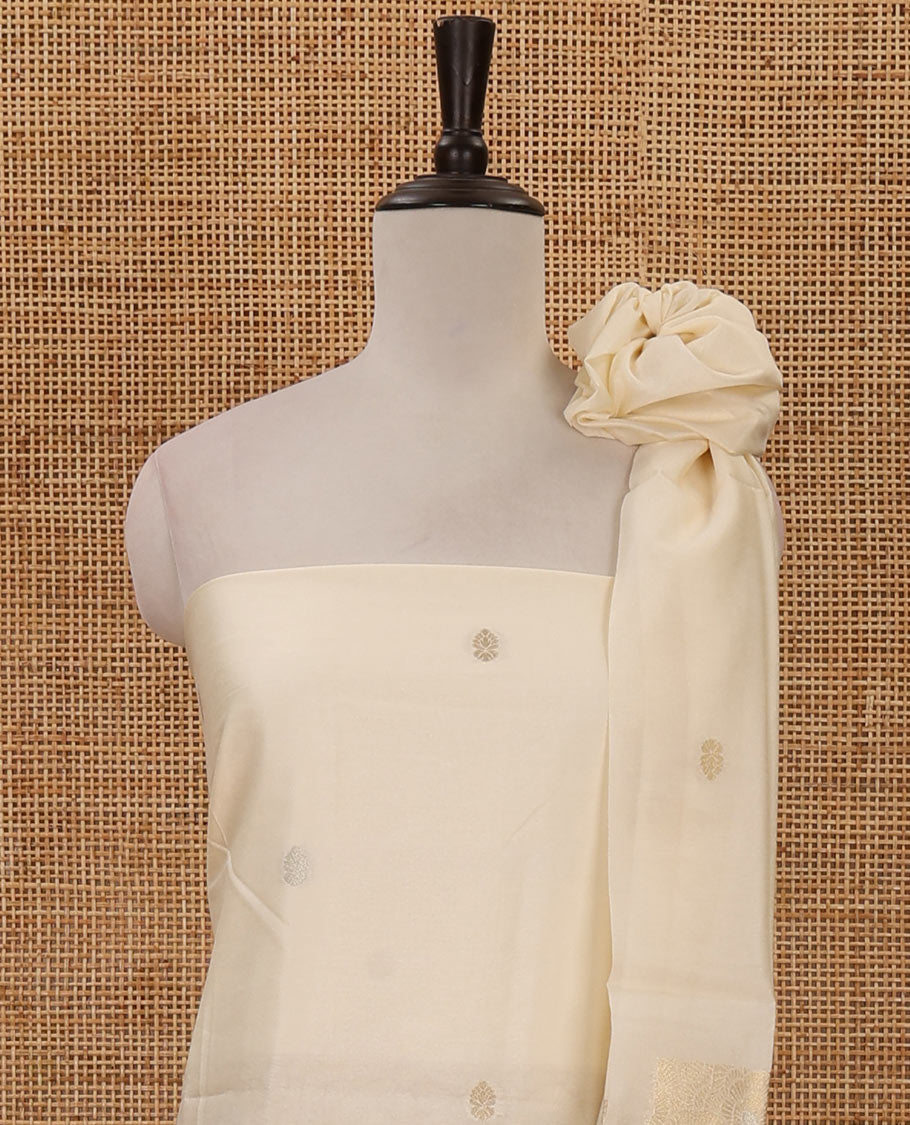 Kerala cream chudidar material, zari buttas & rose-like flowers woven taffeta silk top, plain santoon bottom & zari designs dupatta