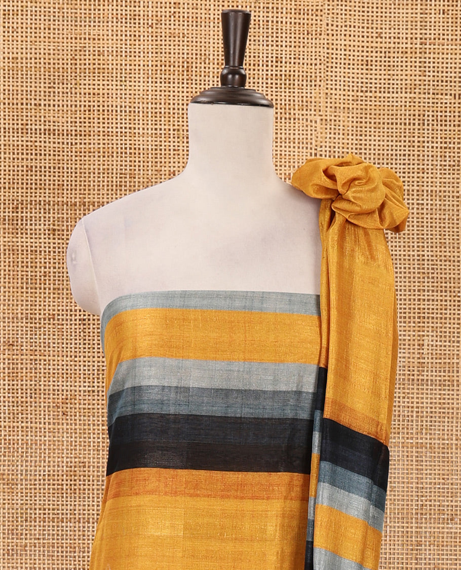 Mustard material chudidar set, horizontal ombre striped semi-tussar top, plain santoon bottom & horizontal ombre striped dupatta with tassels