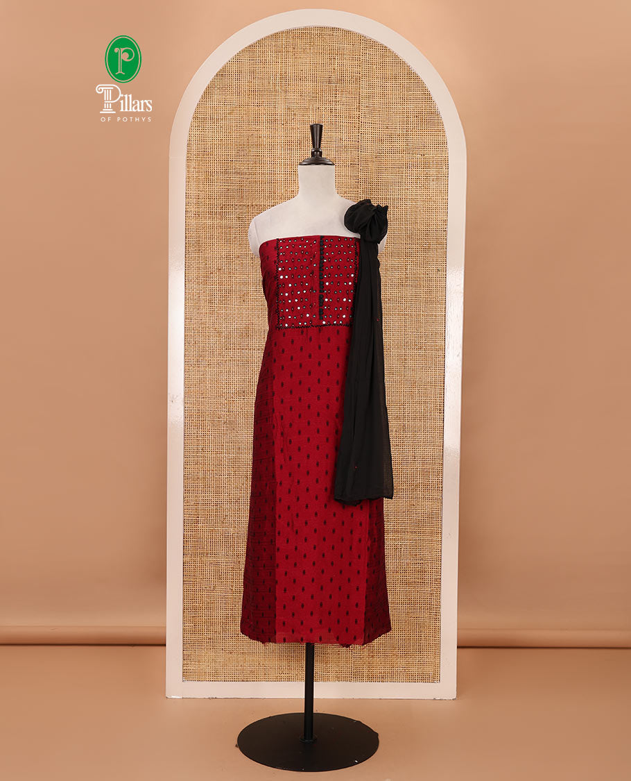 Rani pink material chudidar set, black beads & mirror neck embroidered with buttas woven vichitra silk top, santoon bottom & contrast mirror work chiffon dupatta