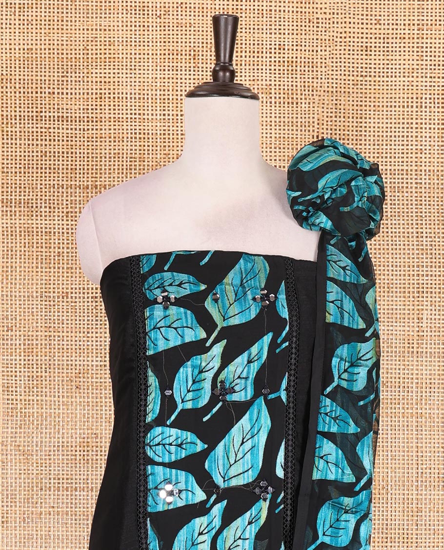 Black and blue material churidar set, neck leaf print with mirror work Vichitra silk top, plain santoon bottom, and leaf printed shimmer georgette dupatta