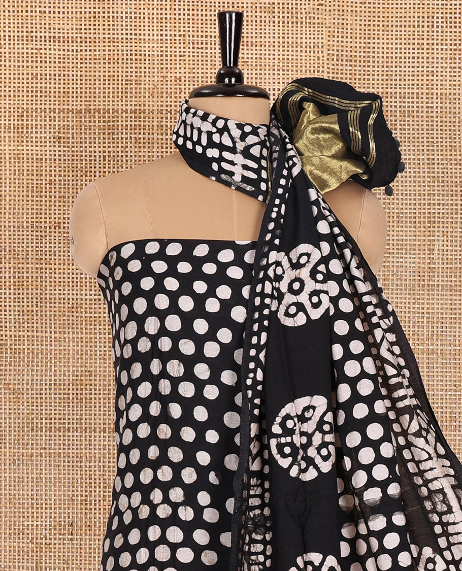 Black material chudidar set, polka dots batik printed modal chanderi top, batik motifs printed bottom, and a batik motifs printed modal chanderi dupatta