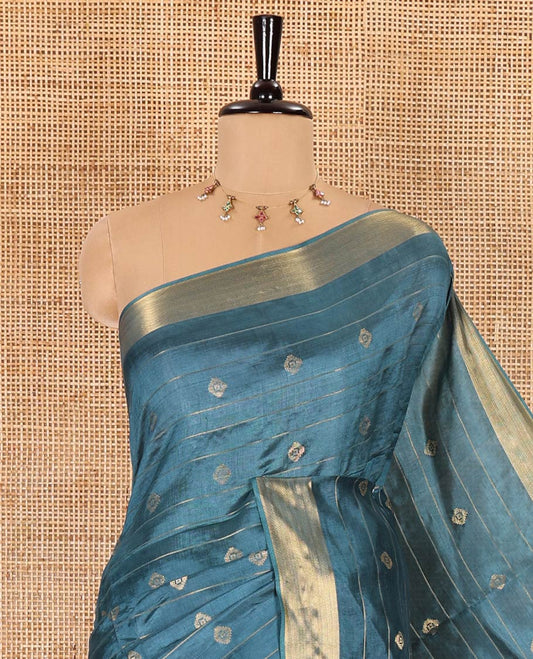 Peacock color zari buttas and striped banana pith saree, bavanji border, zari striped pallu, and a matching blouse