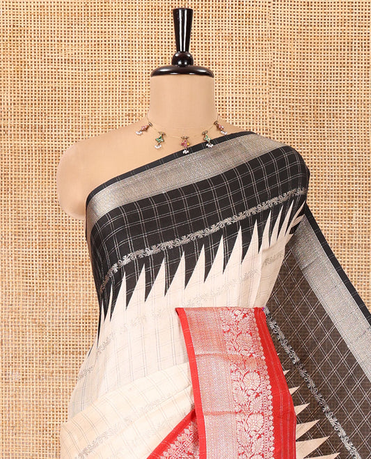 Off-White Fancy Georgette Saree, Subtly Enriched with Zari Designs, Complemented by a Contrast Ganga-Jamuna Zari Temple Border of Traditional Designs, Pallu of Paisleys, and Paired with a Contrast Blouse