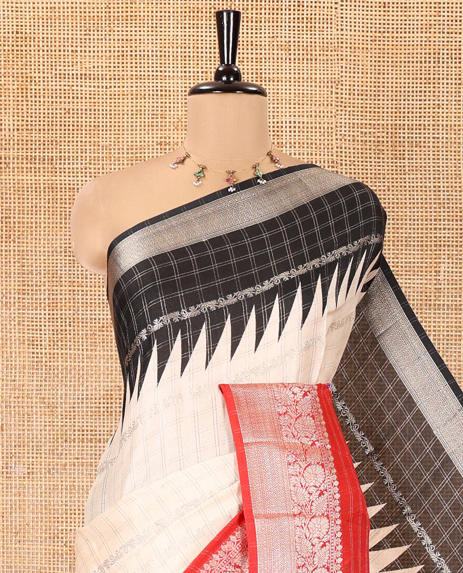 Off-White Fancy Georgette Saree, Subtly Enriched with Zari Designs, Complemented by a Contrast Ganga-Jamuna Zari Temple Border of Traditional Designs, Pallu of Paisleys, and Paired with a Contrast Blouse