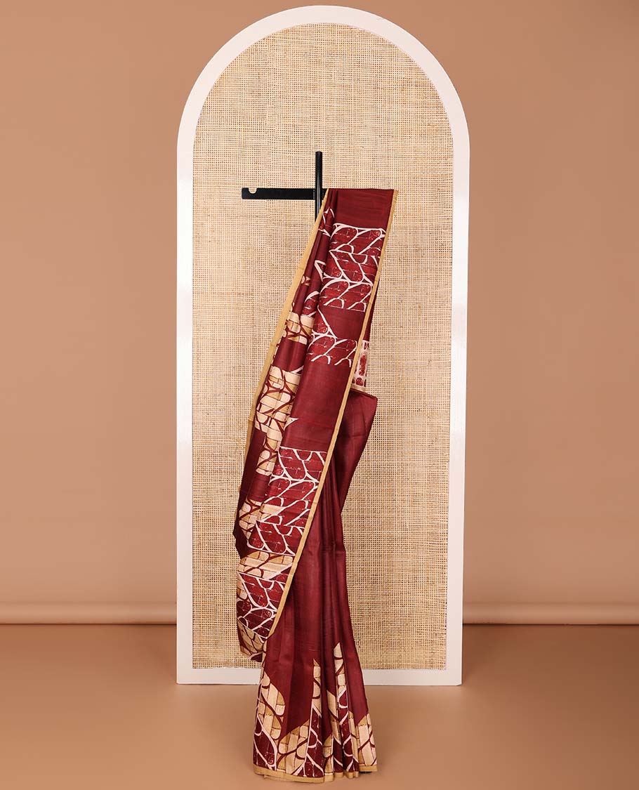 Maroon uniquely geometric printed silk saree with a contrast plain border & printed pallu