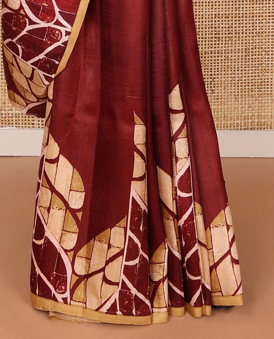 Maroon uniquely geometric printed silk saree with a contrast plain border & printed pallu