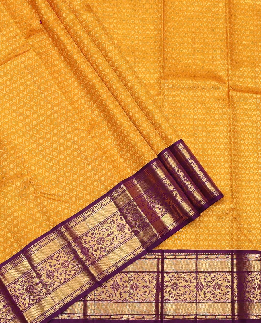 Yellow Pure Silk Half-Saree, Subtly Sparkled with Jacquard Design on Its Skirt, Complemented by a Contrast Zari Design Border, Comes with a Contrast Blouse and a Dhavani of Intricate Zari Weave