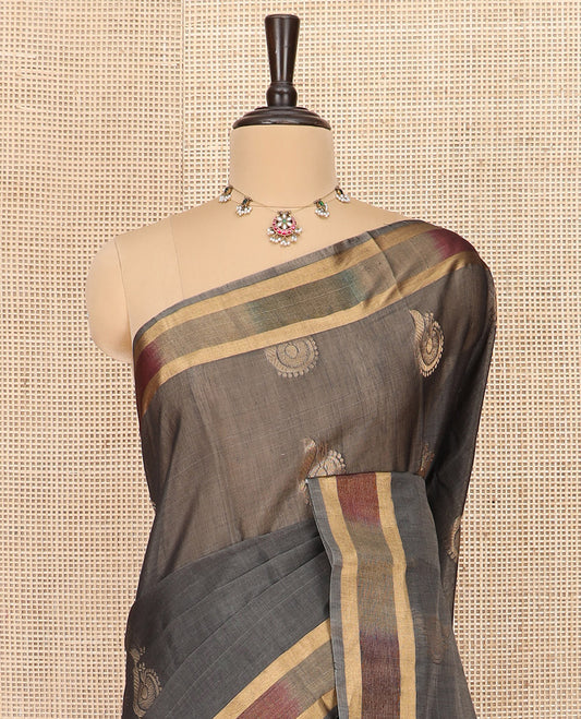 Grey Silk Cotton Saree Decorated with Zari Buttas All Over the Body, Highlighted with Ikkat Border, Contrast Pallu Elevated with Colorful Ikkat Weave, and Paired with a Contrast Blouse