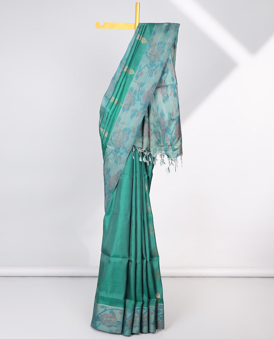 Green floral motifs semi-soft silk saree with contrast border & floral vine design pallu