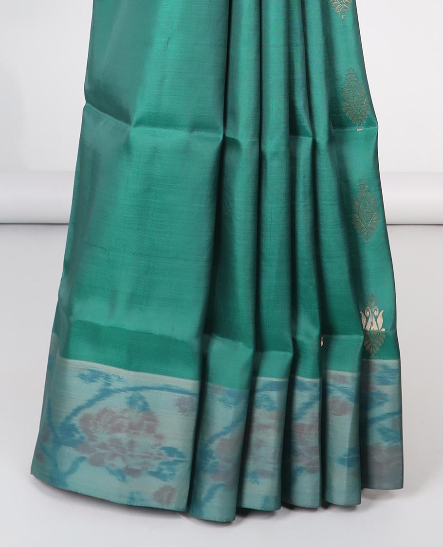 Green floral motifs semi-soft silk saree with contrast border & floral vine design pallu
