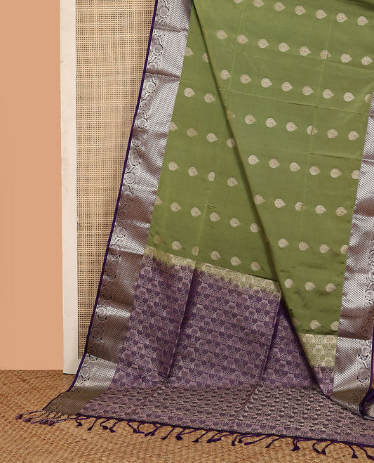 Olive green zari buttas soft silk saree, contrast diamond and floral creeper border, and pallu of lotus floral designs