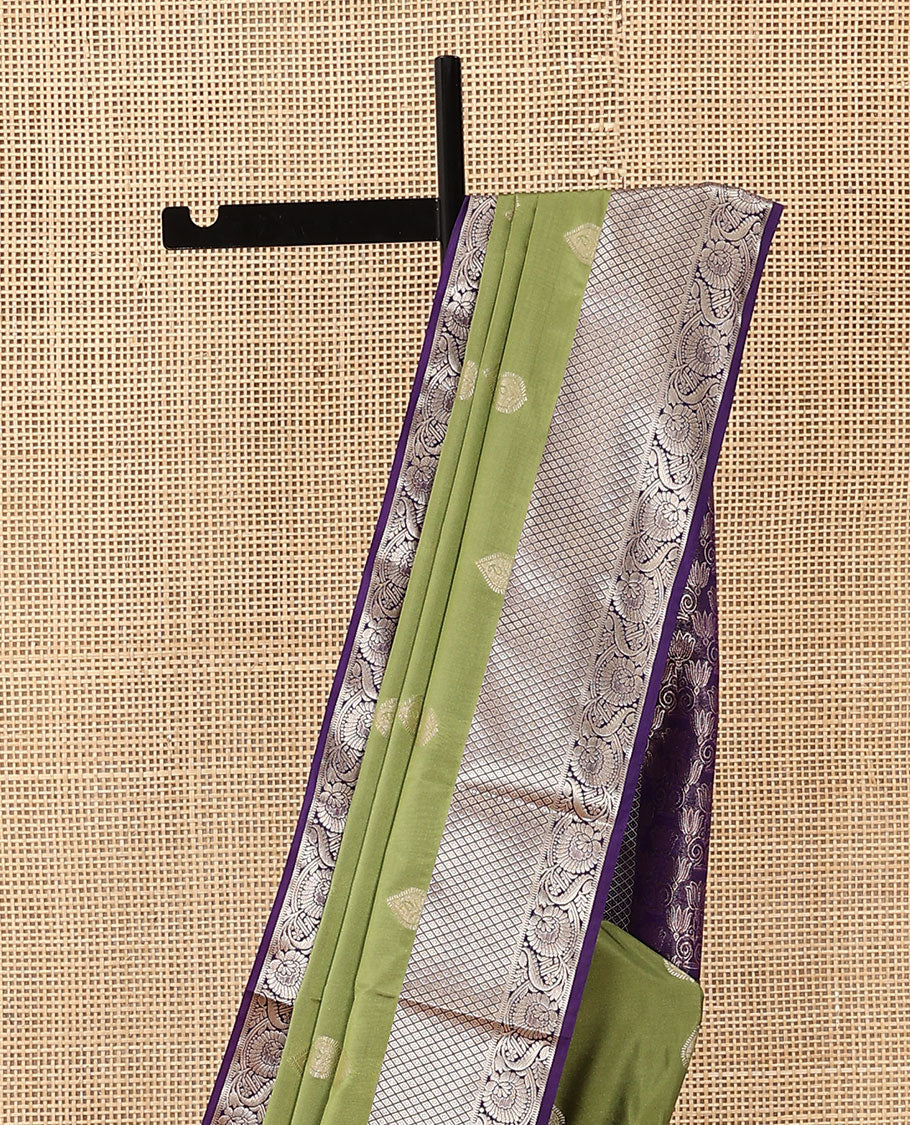 Olive green zari buttas soft silk saree, contrast diamond and floral creeper border, and pallu of lotus floral designs