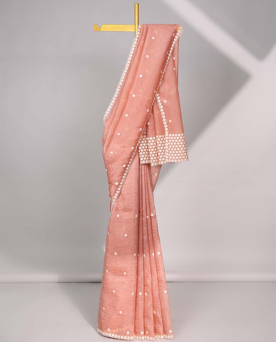 Peach crushed tissue saree with all-over floral motifs embroidered & floral scallop border