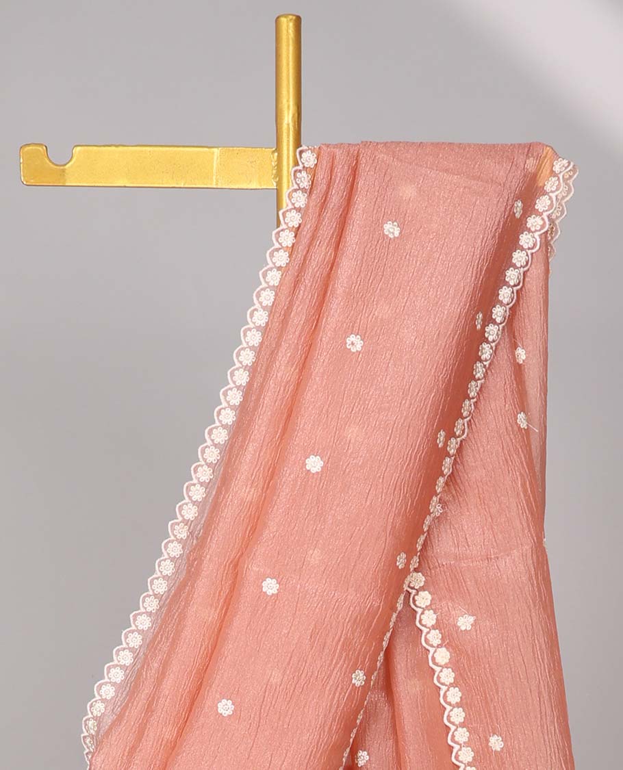 Peach crushed tissue saree with all-over floral motifs embroidered & floral scallop border