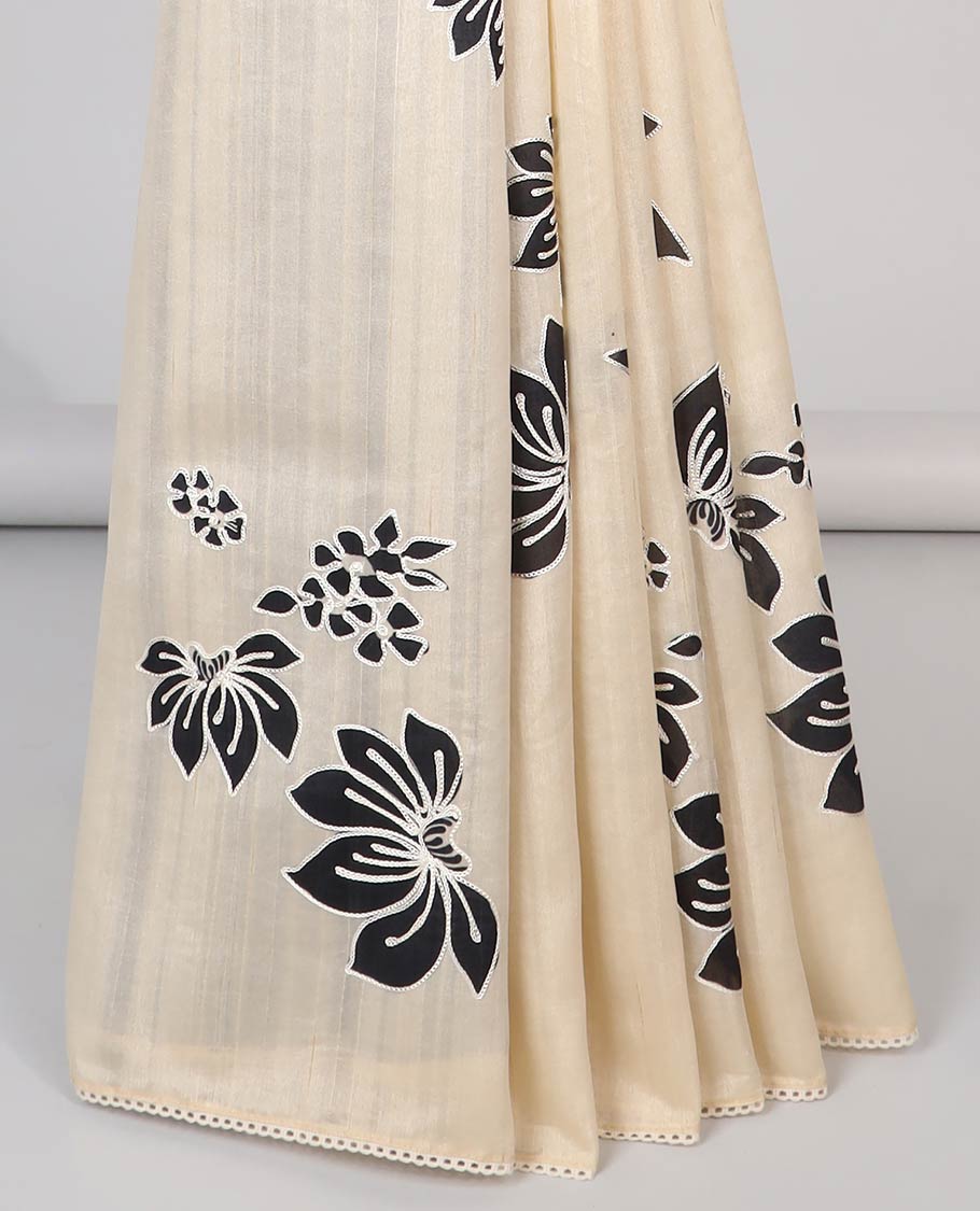 Cream floral design semi-tussar saree with scallop border