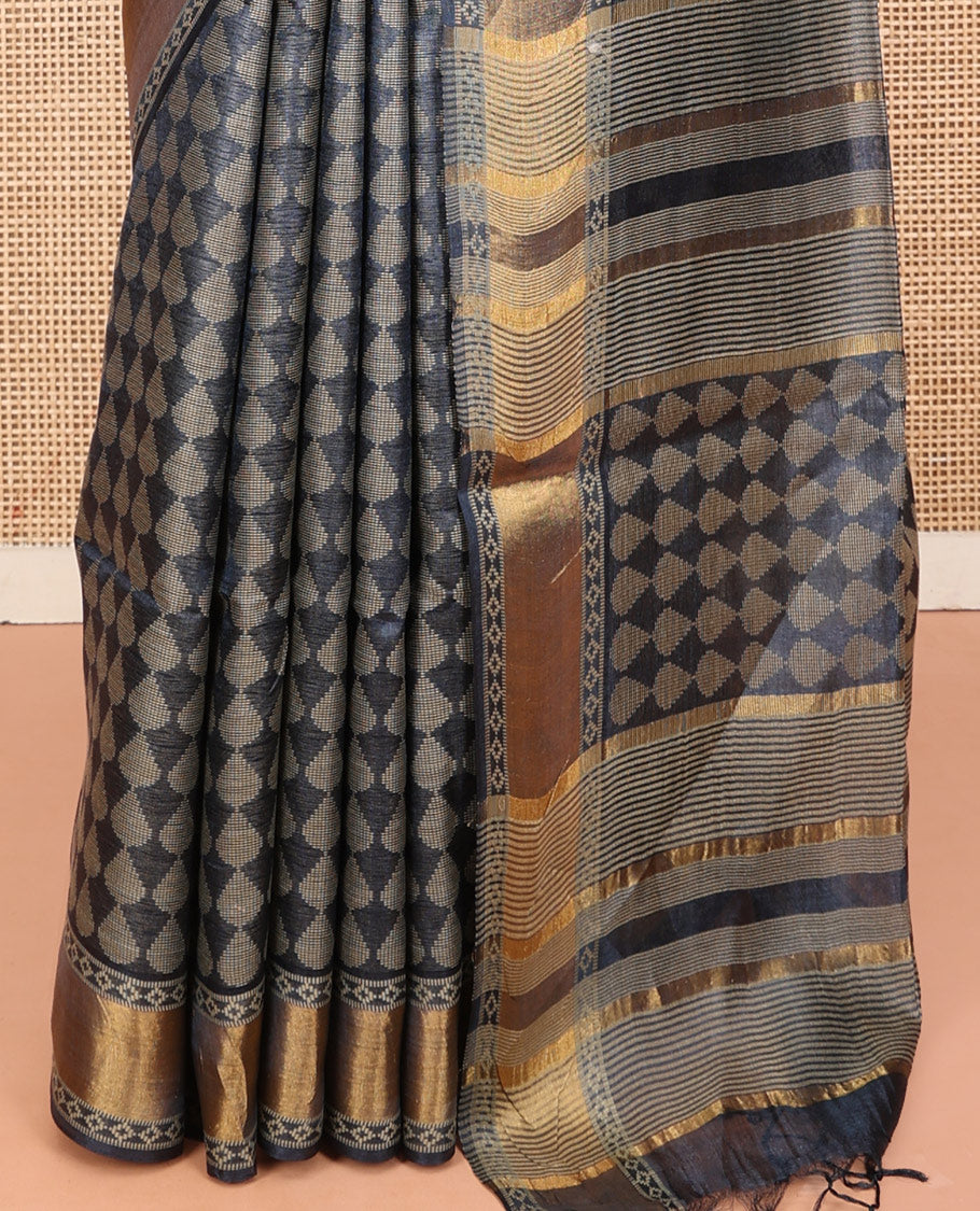 Grey Tussar Silk Saree, Subtly Steeped with Buttas, a Subtle Zari Border, Pallu Features Stripes and Buttas, and a Matching Blouse
