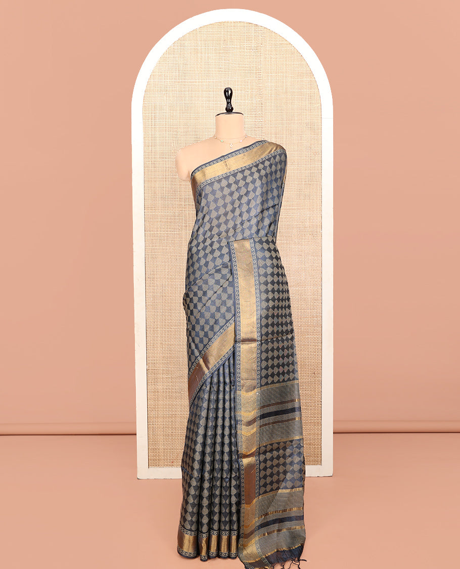Grey Tussar Silk Saree, Subtly Steeped with Buttas, a Subtle Zari Border, Pallu Features Stripes and Buttas, and a Matching Blouse