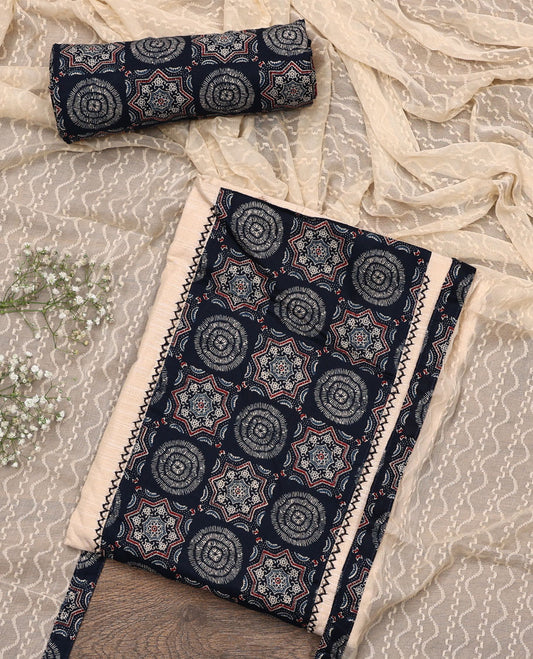 Cream-blue material chudidar set, Ajrakh printed patch neck work top, contrast Ajrakh printed bottom, and thread embroidered dupatta