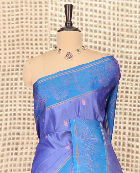 Blue Semi Uppada Saree Ornamented with Zari Buttas, Complemented by a Contrast Zari Woven Border, Pallu of Floral and Leaf Designs, and Paired with a Contrast Blouse