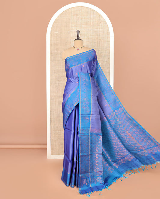 Blue Semi Uppada Saree Ornamented with Zari Buttas, Complemented by a Contrast Zari Woven Border, Pallu of Floral and Leaf Designs, and Paired with a Contrast Blouse
