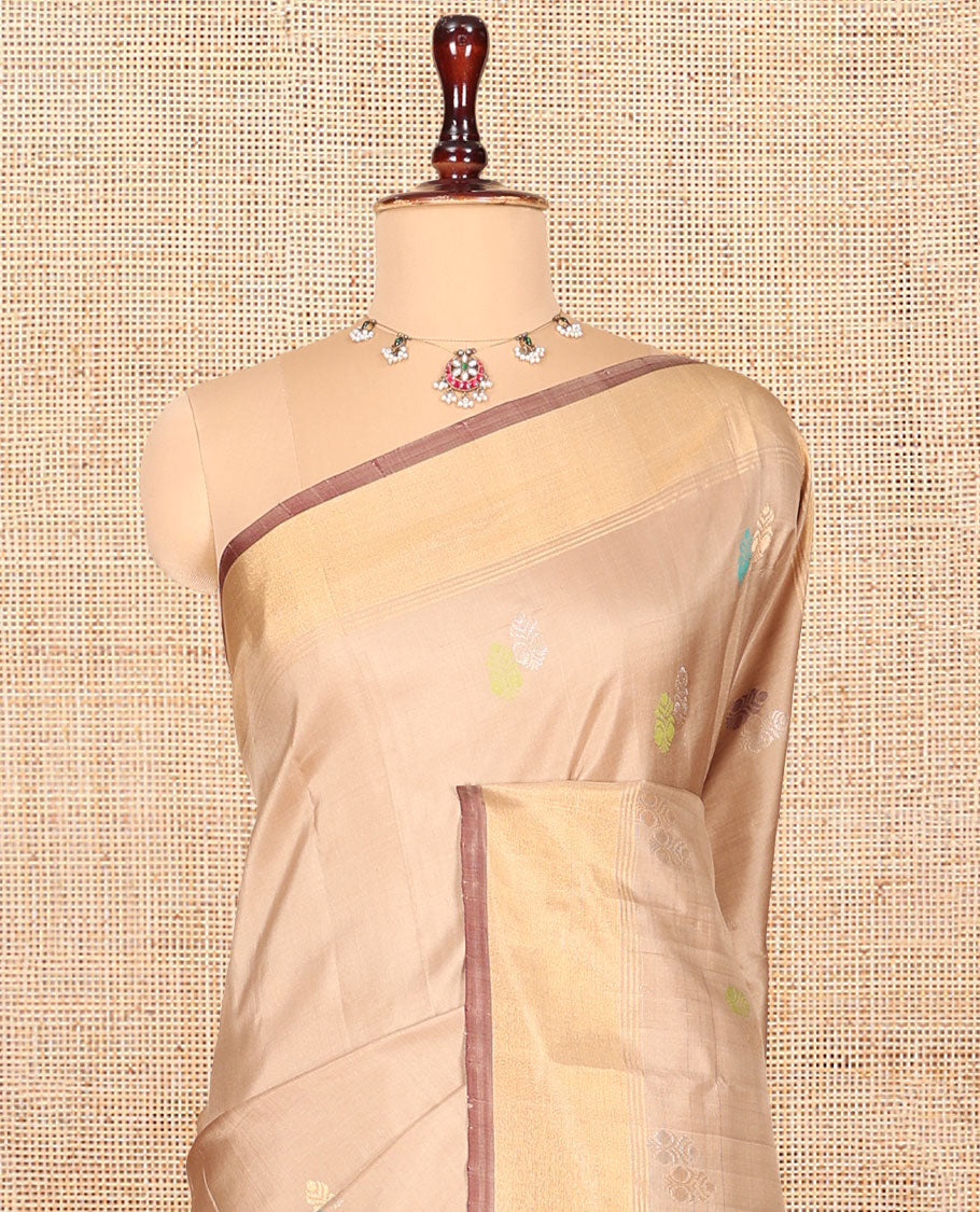Sandal Uppada Silk Saree, Sparsely Sparkled with Buttas, a Subtle Zari Border, Contrast Zari Woven Pallu, and a Contrast Blouse