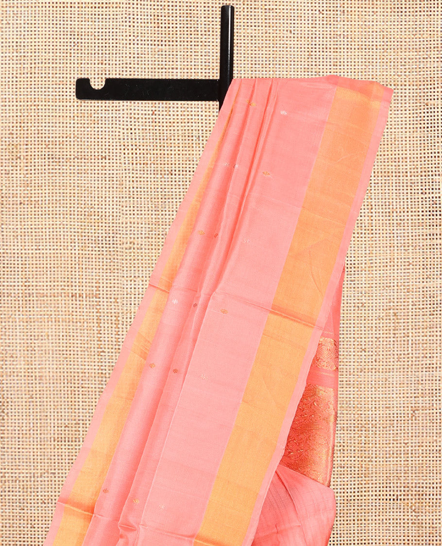Coral Pink Uppada Silk Saree, Dazzled with Zari Buttas, a Bavanji Border, Grand Floral Jaal Pallu, and a Matching Blouse