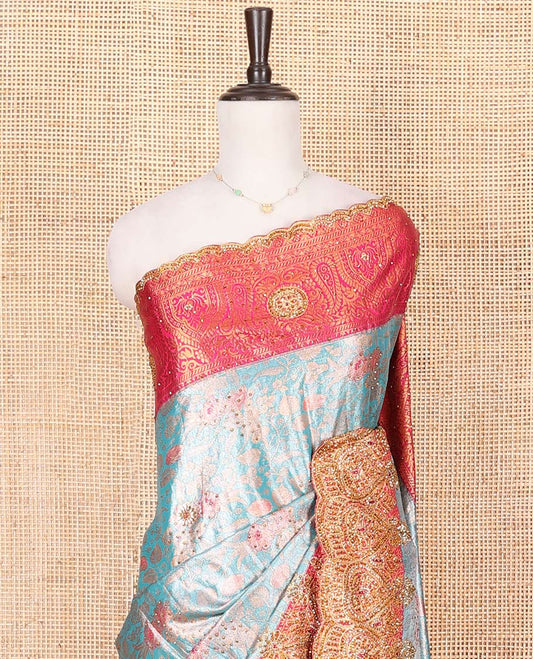 Blue Vastrakala Silk Saree, Prettified with Jacquard and Embroidery, Complemented by Contrast Traditional Zari and Patch Embroidered Scallop Border, Gleaming Grand Stone Work Pallu, and Paired with Contrast Embroidered Blouse