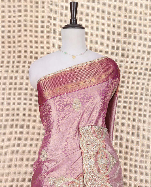 Pink Vastrakala Silk Saree, Opulently Embellished with Floral Jacquard and Patch Stone Work, Highlighted by Traditional Zari Design and Intricate Embroidered Scallop Border, Grand Scallop Design Stone Work Pallu, and Paired with Heavy Embroidered Blouse