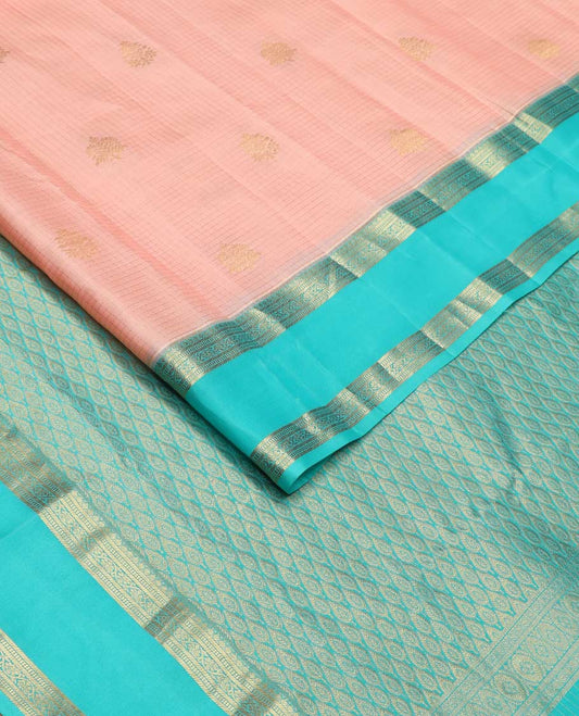 Pink buttas and micro-checked Vasundhara silk mix saree, contrast rettai pettu border of thilakam, banaras, muthu, and kodi visiry designs, and pallu of peacock feathers