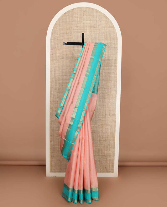 Pink buttas and micro-checked Vasundhara silk mix saree, contrast rettai pettu border of thilakam, banaras, muthu, and kodi visiry designs, and pallu of peacock feathers