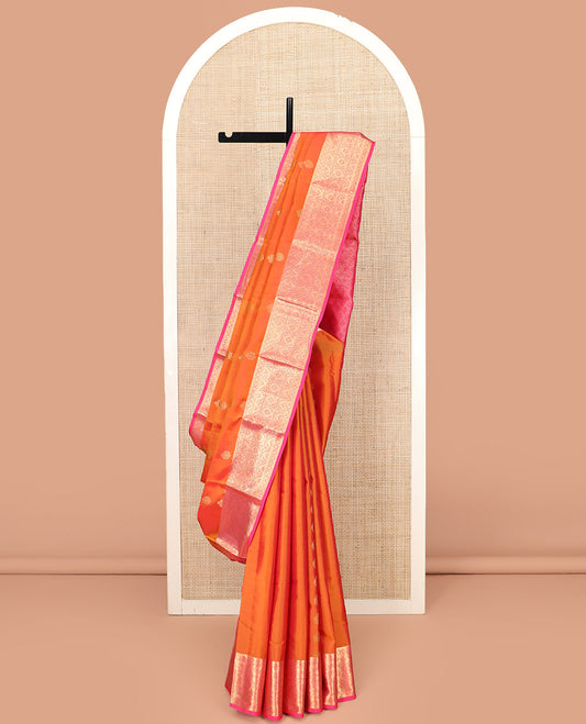 Orange Vasundhara Lite Silk Mix Saree, Spotlighted with Zari Buttas All Over Its Body, Complemented by a Contrast Zari Border, Grand Woven Pallu of Jaal Designs, and Paired with a Contrast Blouse