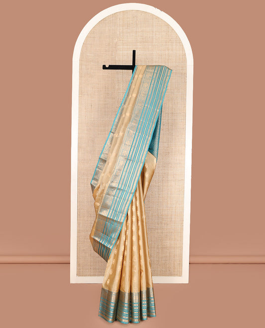 Gold Vasundhara Lite Silk Mix Saree, Bedecked with Iruthalai Pakshi Zari Buttas, Complemented by a Contrast Border of Rekku, Iruthalai Pakshi, Muthu, Laddu Kamalam, and Rudraksham, Opulently Embellished Pallu, and Paired with a Contrast Blouse