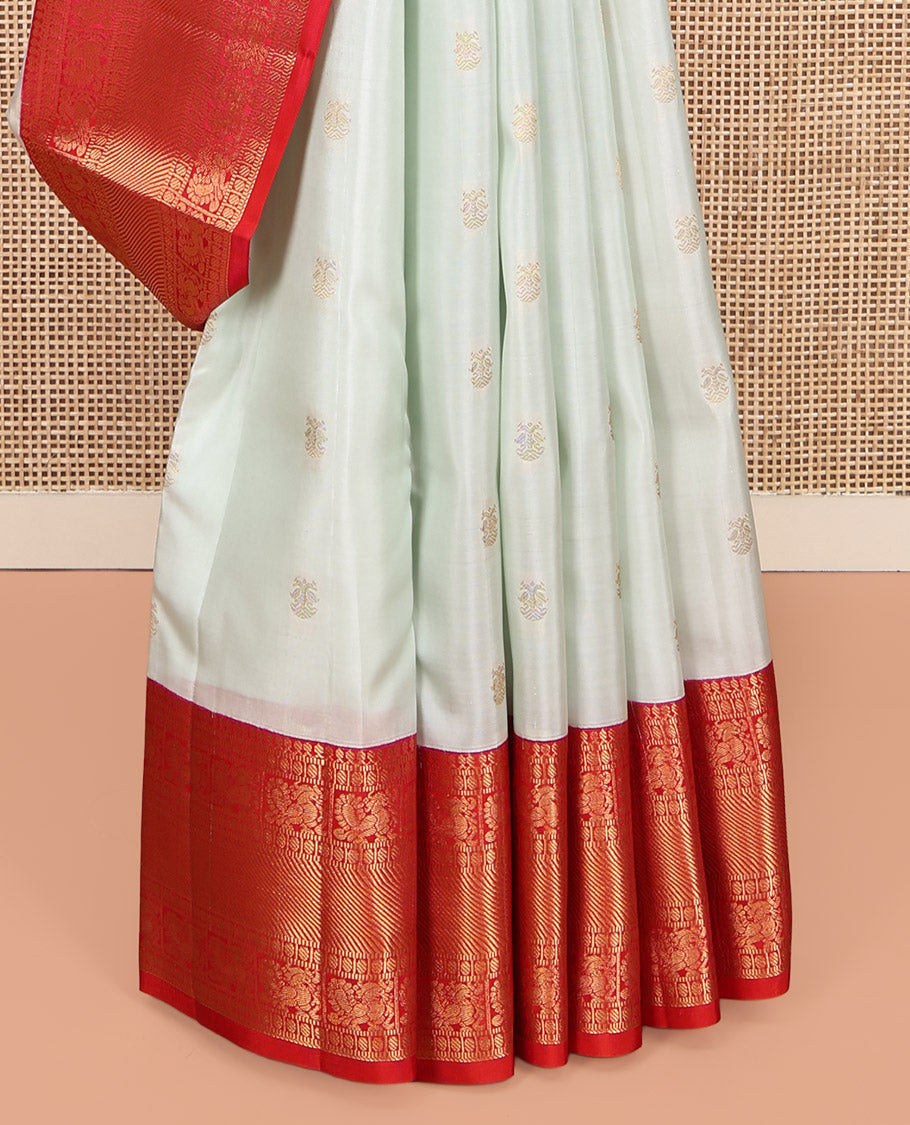 Off-White Vasundhara Lite-Silk Mix Saree, Enthralled with Iruthalai Pakshi Buttas, a Contrast Border of Thilakam Mokku, Muthu, Paisa, and Mayil Designs, Grand Pallu, and a Contrast Blouse