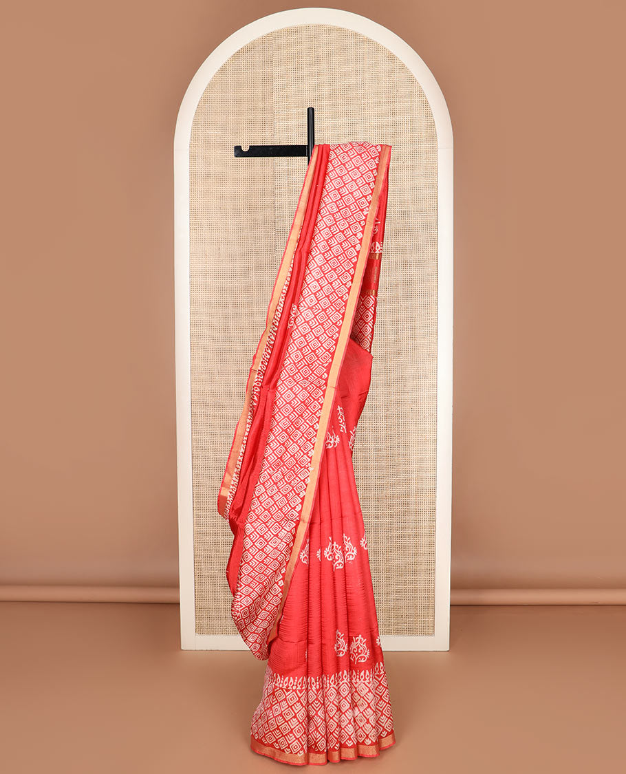 Red unique motifs printed banana pith saree, border of zari with print work, and printed pallu