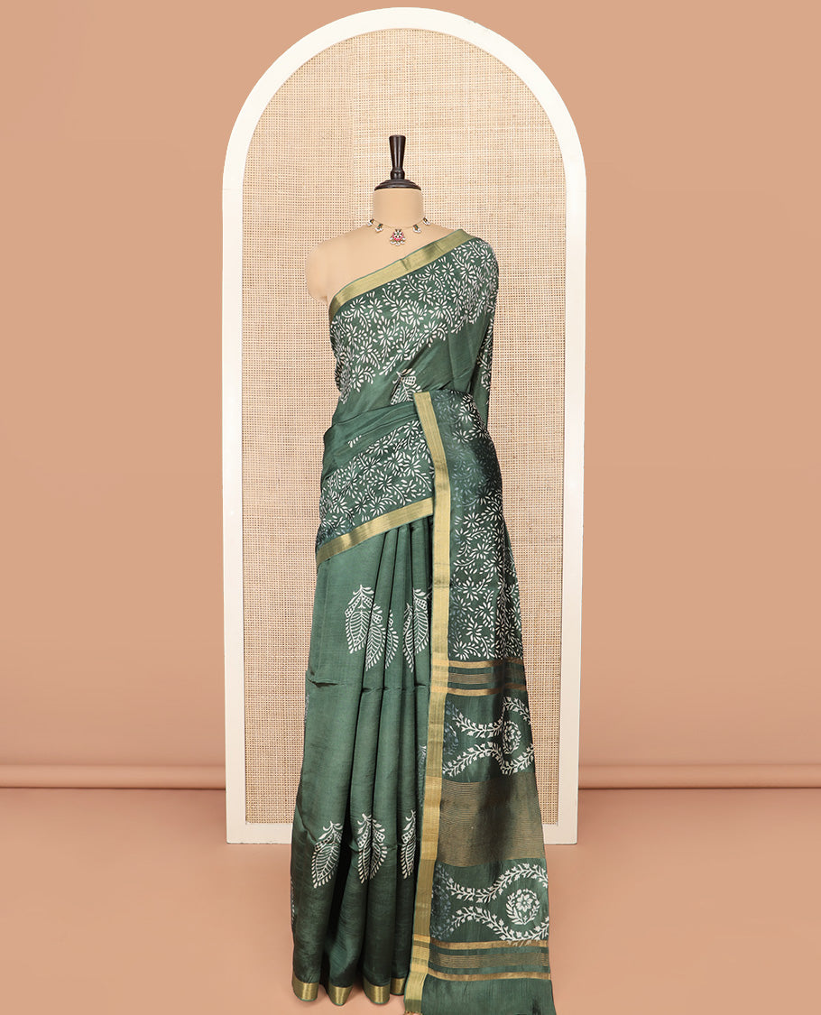 Green Banana Pith Saree Highlighted  with Floral Motifs Printed All Over Its Body, Zari Bavanji Border, Pallu of Print and Zari Work, and Paired with a Matching Blouse