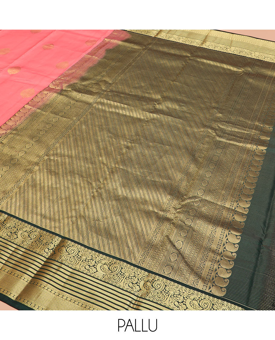 Pink Vasundhara Silk Saree Embellished with Zari Buttas and Stripes, Complemented by a Contrast Border of Rekku, Banaras, and Mayil Kann Designs, Pallu Gleamed Up with Intricate Designs, and Paired with a Contrast Blouse
