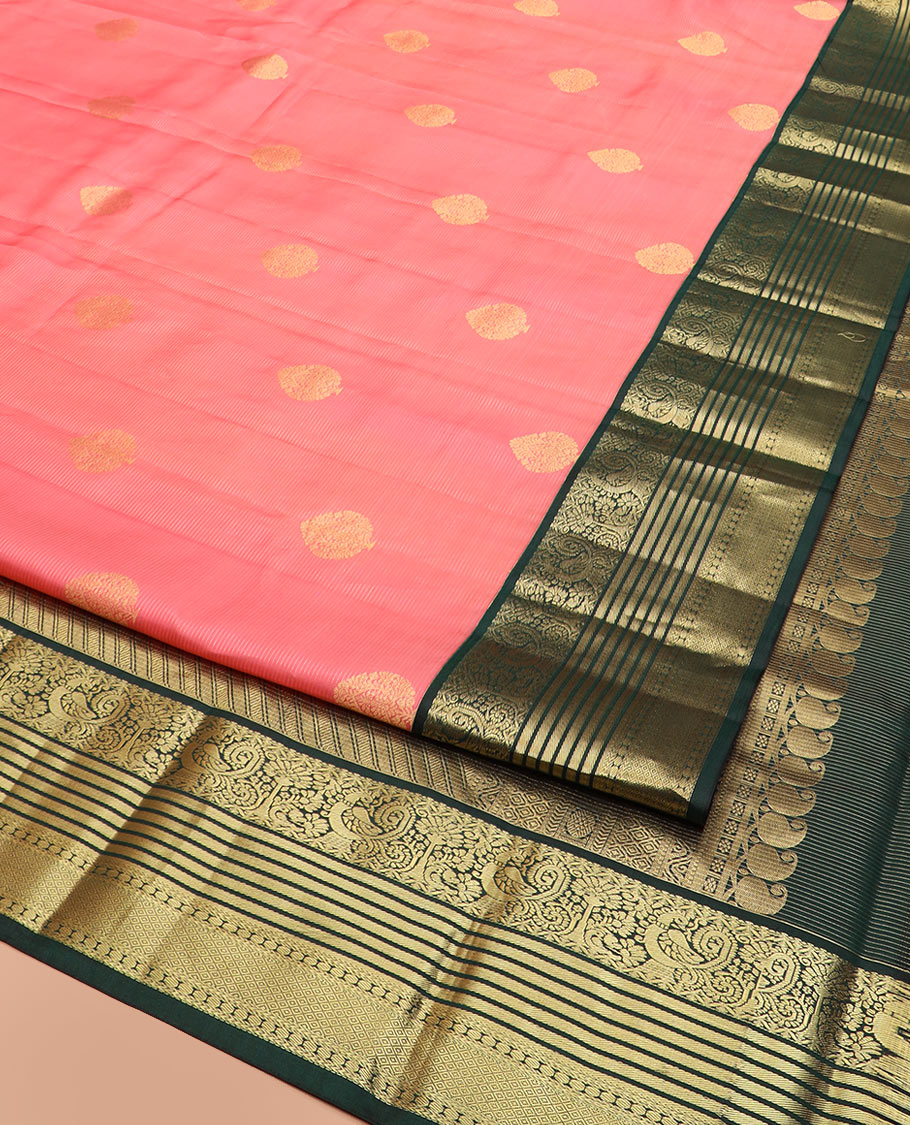 Pink Vasundhara Silk Saree Embellished with Zari Buttas and Stripes, Complemented by a Contrast Border of Rekku, Banaras, and Mayil Kann Designs, Pallu Gleamed Up with Intricate Designs, and Paired with a Contrast Blouse