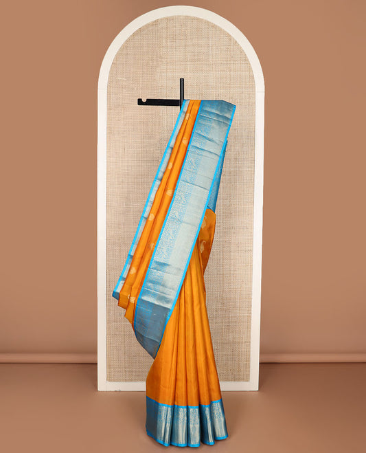 Orange zari buttas silk saree, contrast border of salngai,poun,kili,kamalam & mayil kann & jaal pallu