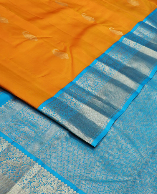 Orange zari buttas silk saree, contrast border of salngai,poun,kili,kamalam & mayil kann & jaal pallu