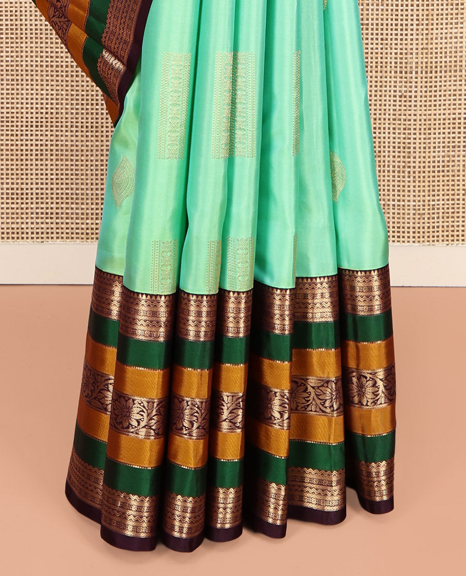 Sea Green Vasundhara Silk Saree, Elevated with Zari Buttas, Contrast Traditional Kodi Visiry Border, Grand Jaal Pallu, and a Contrast Blouse
