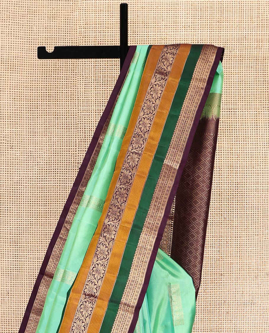 Sea Green Vasundhara Silk Saree, Elevated with Zari Buttas, Contrast Traditional Kodi Visiry Border, Grand Jaal Pallu, and a Contrast Blouse