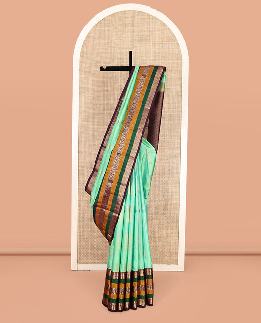 Sea Green Vasundhara Silk Saree, Elevated with Zari Buttas, Contrast Traditional Kodi Visiry Border, Grand Jaal Pallu, and a Contrast Blouse