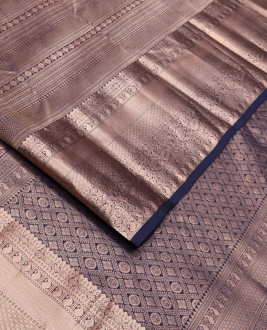 Blue jacquard Kanchipuram wedding silk saree, zari border of thilakam mokku, chakram, kathir, manga, kuyil kann, jaal, and manga designs, and jaal pallu