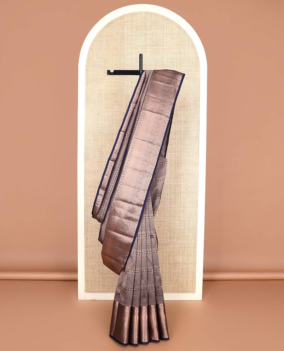 Blue jacquard Kanchipuram wedding silk saree, zari border of thilakam mokku, chakram, kathir, manga, kuyil kann, jaal, and manga designs, and jaal pallu