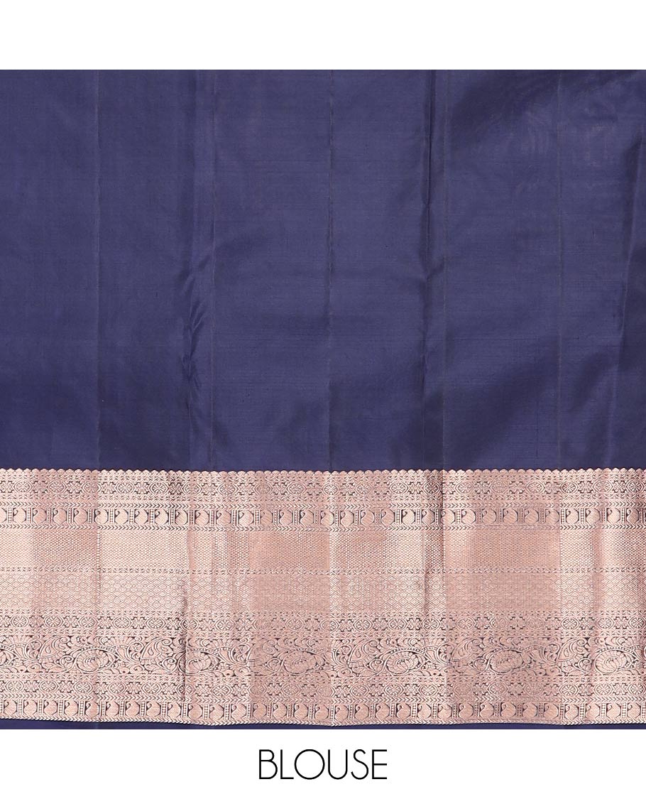 Blue jacquard Kanchipuram wedding silk saree, zari border of thilakam mokku, chakram, kathir, manga, kuyil kann, jaal, and manga designs, and jaal pallu