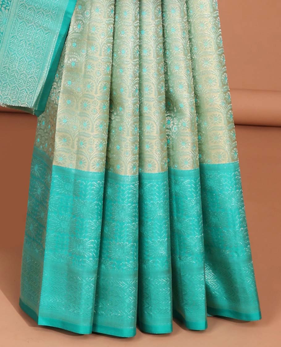 Green checked kancheepuram silk saree with contrast zari design border & pallu od argyle pattern