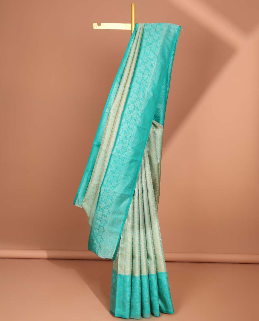 Green checked kancheepuram silk saree with contrast zari design border & pallu od argyle pattern