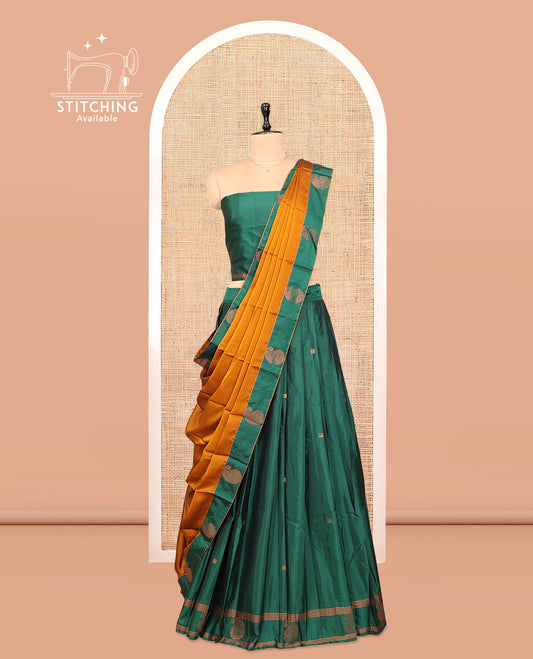 Green Cotton Half-Saree Features Buttas Skirt, a Paisley Border, a Matching Blouse, and a Contrast Dhavani